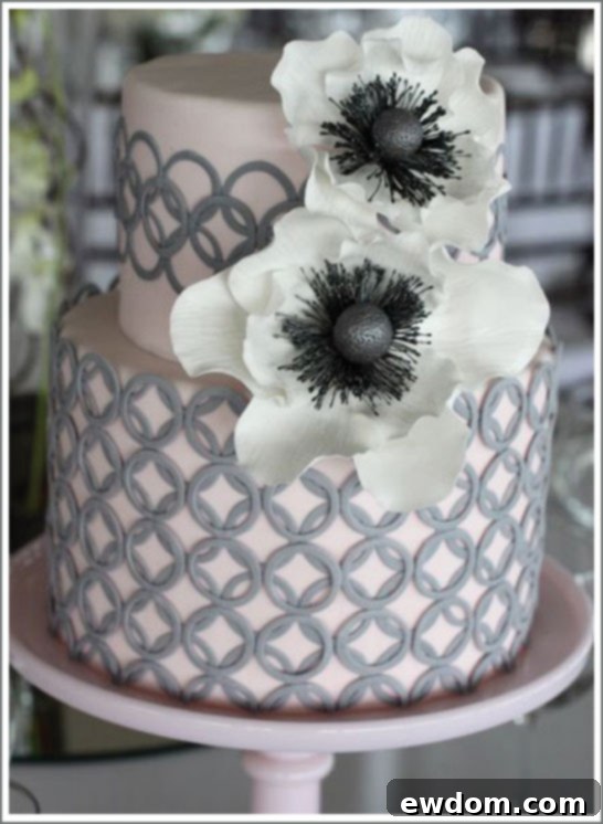 Stunning Modern Grey Wedding Cake with Geometric Pattern and Anemones