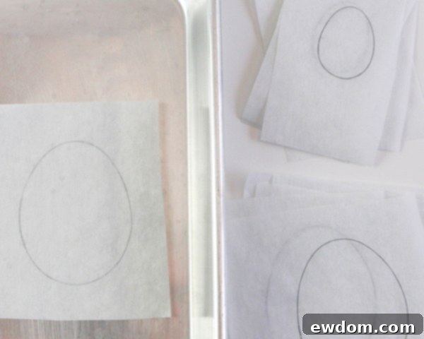 Elegant Swirl Easter Chocolates 9 Parchment paper squares with traced egg outlines, cut and ready for the chocolate decorating process.