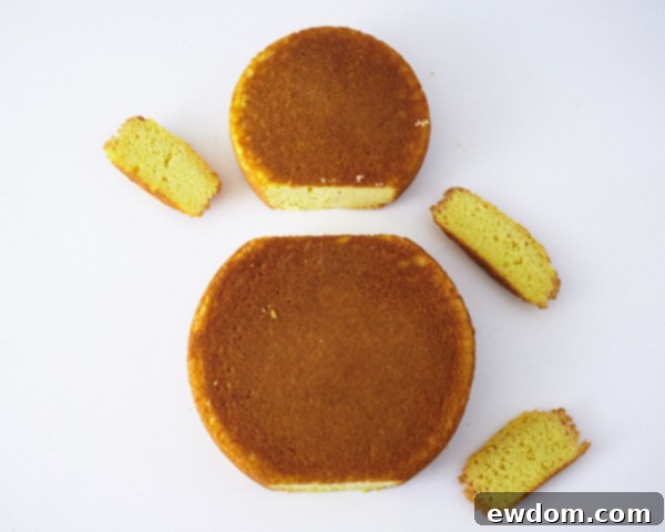 Matryoshka Magic Cake 8 Step-by-step guide: Trimming cake layers to create flat surfaces for the Russian nesting doll cake. Cake by Cakegirls.