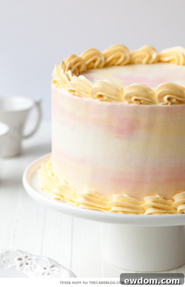 Close-up of a slice of Lemon Honey Apricot Cake showcasing layers and texture