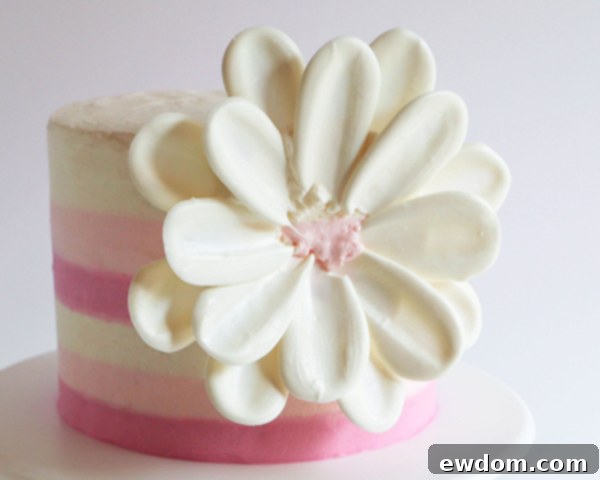 Another view of the developing chocolate flower, with subsequent rows of petals being added to build volume and shape.