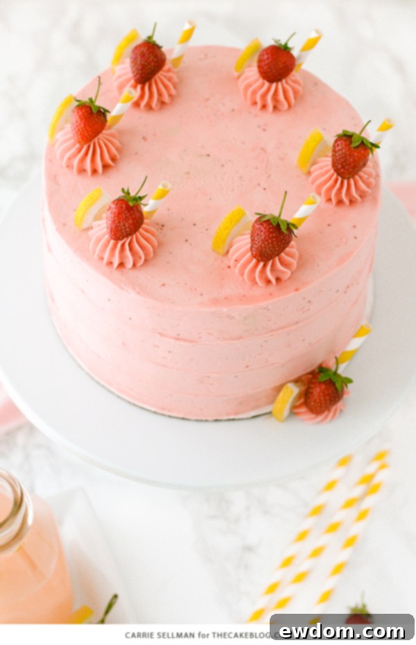 Strawberry Lemonade Cake - tender lemon cake paired with fresh strawberry buttercream | by Carrie Sellman for TheCakeBlog.com