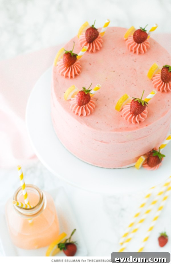 Strawberry Lemonade Cake - tender lemon cake paired with fresh strawberry buttercream | by Carrie Sellman for TheCakeBlog.com