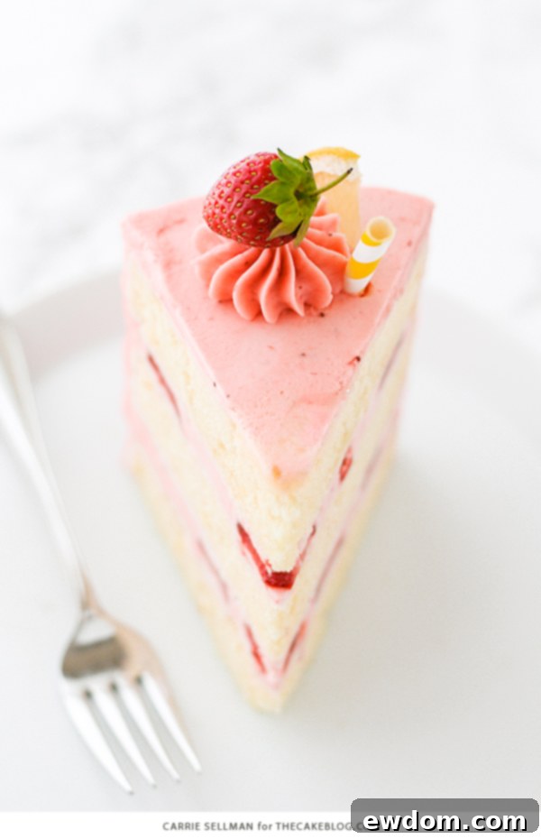 Strawberry Lemonade Cake - tender lemon cake paired with fresh strawberry buttercream | by Carrie Sellman for TheCakeBlog.com