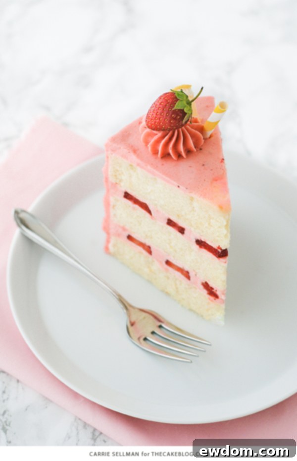 Strawberry Lemonade Cake - tender lemon cake paired with fresh strawberry buttercream | by Carrie Sellman for TheCakeBlog.com