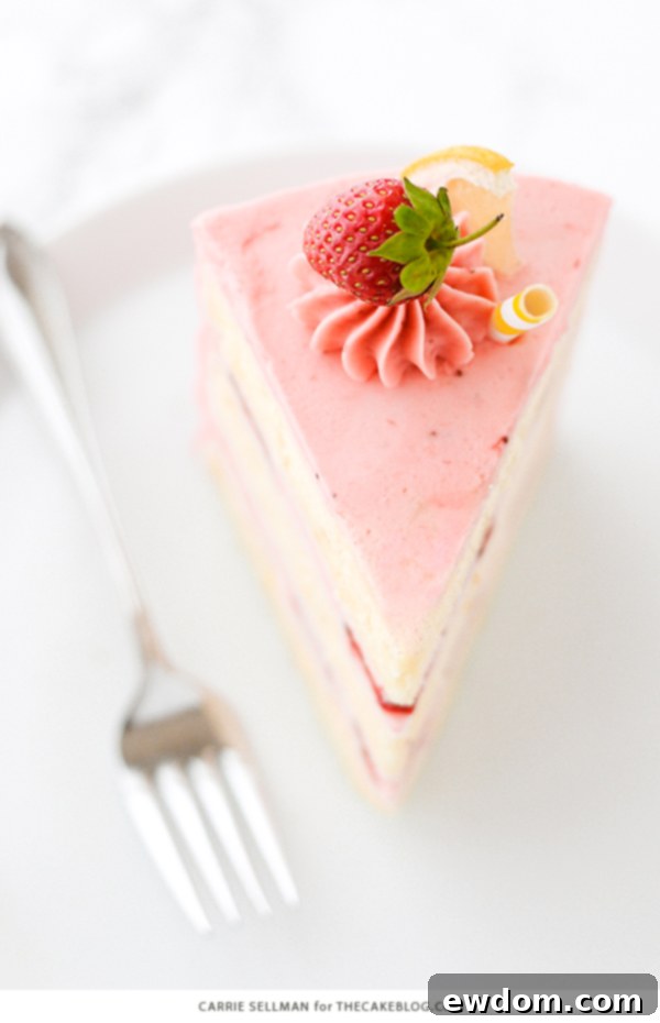 Strawberry Lemonade Cake - tender lemon cake paired with fresh strawberry buttercream | by Carrie Sellman for TheCakeBlog.com