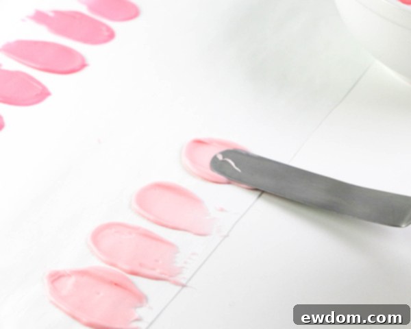 Pink Paradise Flamingo Cake 13 A selection of hardened chocolate brushstroke feathers, ready for assembly