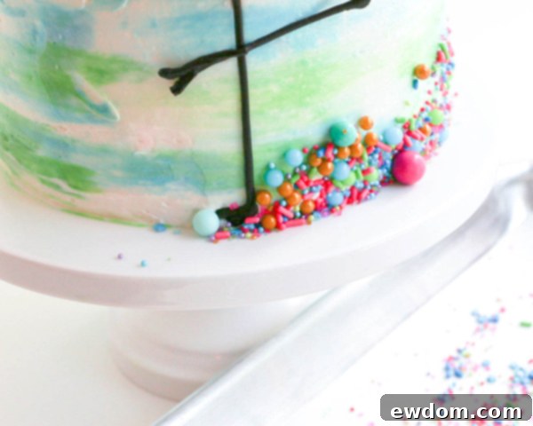 Pink Paradise Flamingo Cake 43 The cake with a vibrant band of sprinkles applied around the base