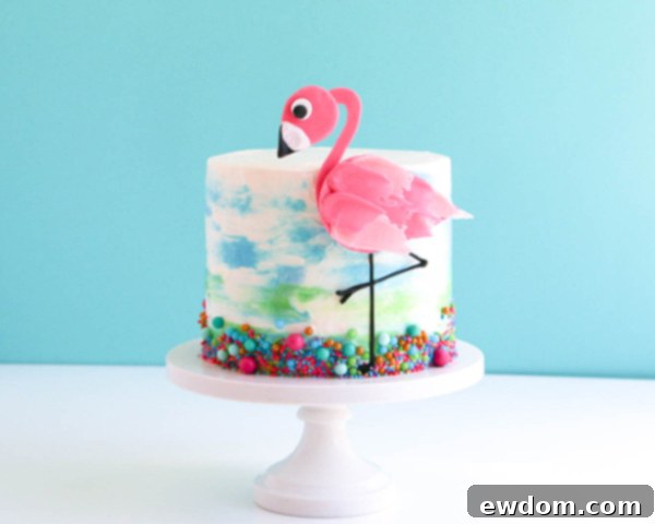 Pink Paradise Flamingo Cake 44 The final masterpiece: a beautifully decorated flamingo cake with chocolate topper and sprinkles