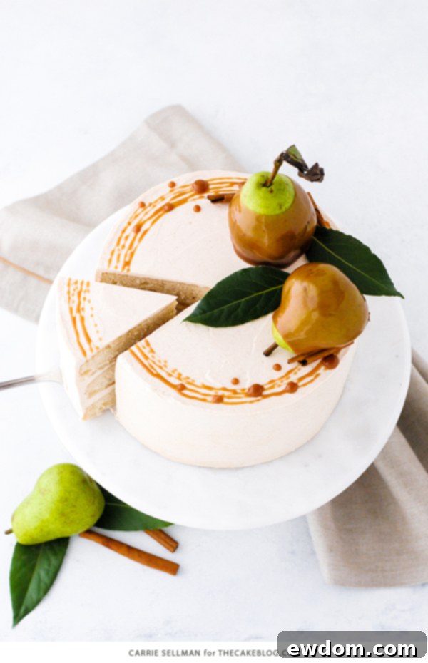 Decadent Salted Caramel Pear Delight 11 Close-up of a slice of Salted Caramel Pear Cake, revealing moist layers and generous frosting.