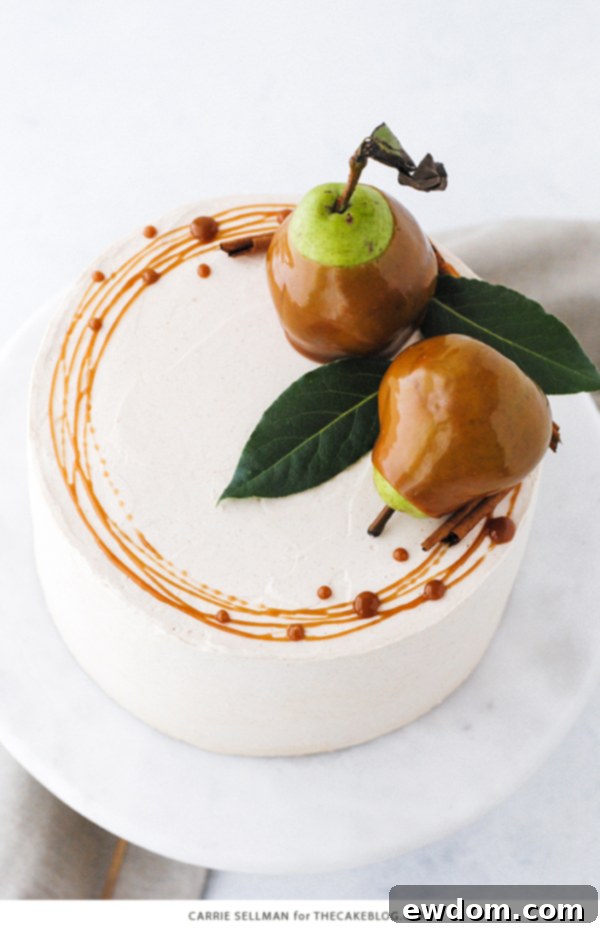 Decadent Salted Caramel Pear Delight 4 Close-up of a rustic Salted Caramel Pear Cake adorned with fresh pears, cinnamon sticks, and bay leaves.