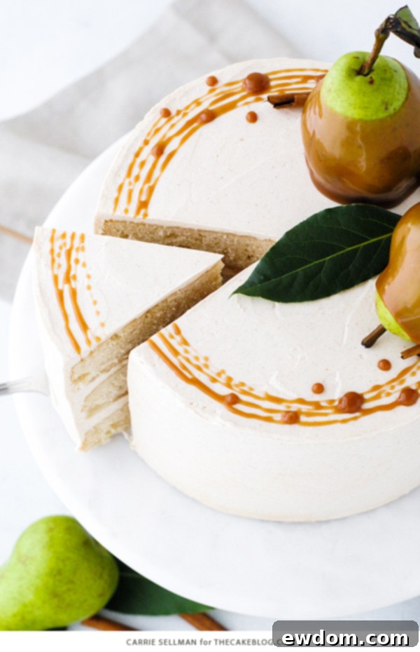 Decadent Salted Caramel Pear Delight 6 Close-up detail of a tiered Salted Caramel Pear Cake, showing texture and garnishes.