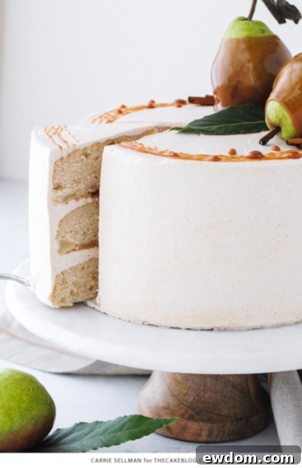 Decadent Salted Caramel Pear Delight 7 Top view of the Salted Caramel Pear Cake with decorative caramel swirls and fresh pears.