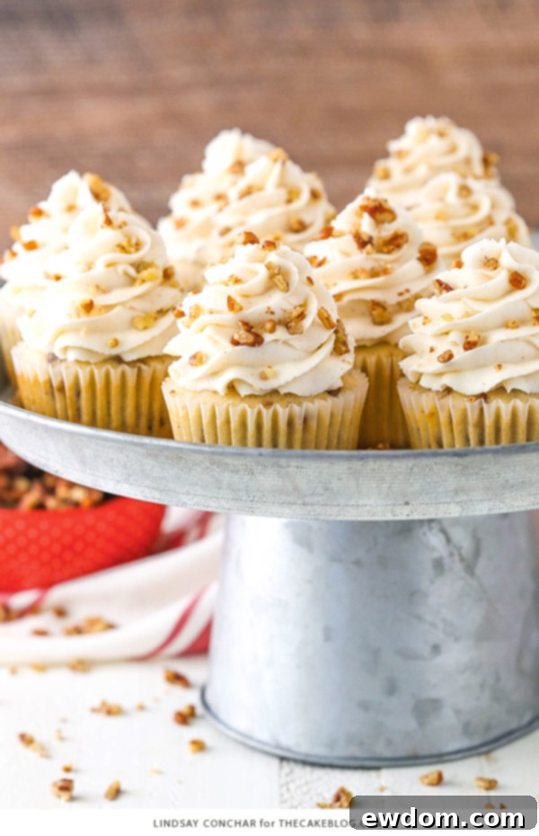 Butter Pecan Cupcakes - moist vanilla cupcakes studded with toasted butter pecans and topped with cinnamon buttercream frosting | A perfect blend of sweet and nutty