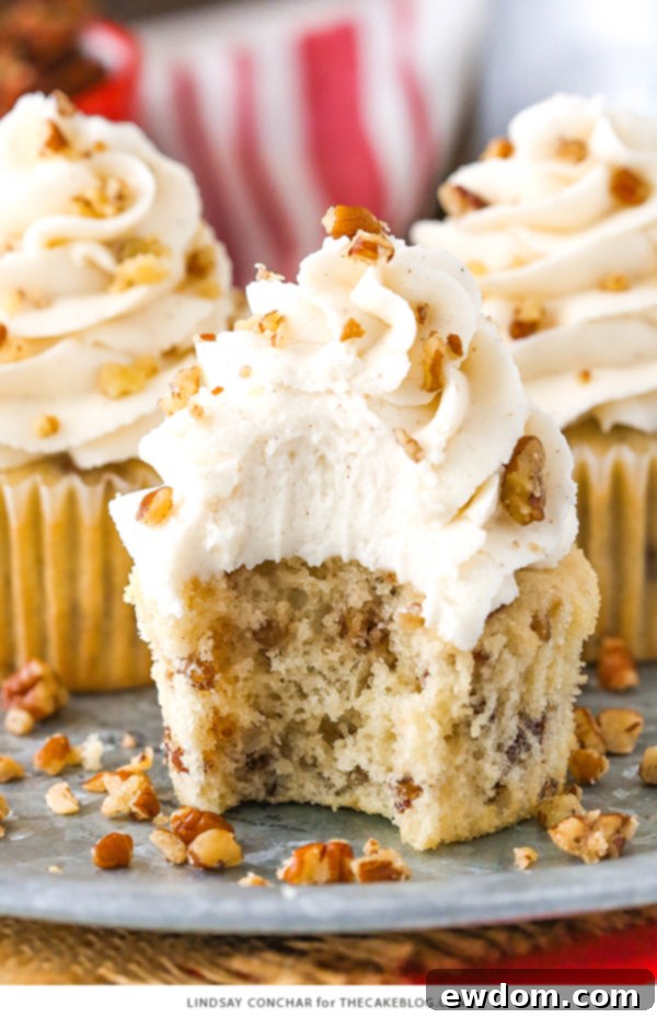 Butter Pecan Cupcakes - moist vanilla cupcakes studded with toasted butter pecans and topped with cinnamon buttercream frosting | Ready to enjoy!