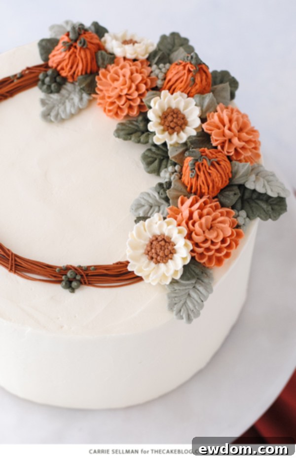 Cozy Pumpkin Spice Treat 3 A slice of Pumpkin Spice Cake on a rustic wooden table, decorated with fall-themed buttercream flowers