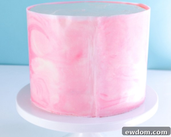 Zebra Chocolate Cake 26 Marbled Chocolate Cake - how to wrap a cake with marbled chocolate | by Erin Gardner for TheCakeBlog.com