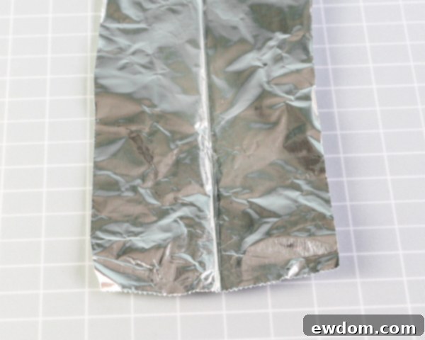 Zebra Chocolate Cake 7 Marbled Chocolate Cake - how to wrap a cake with marbled chocolate | by Erin Gardner for TheCakeBlog.com