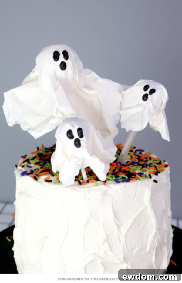 Chocolate Lollipop Ghosts - how to make edible lollipop ghosts for Halloween cakes and cupcakes using white chocolate and suckers | by Erin Gardner for TheCakeBlog.com