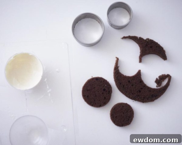 Cutting cake layers with round cutters for mini ornament cakes