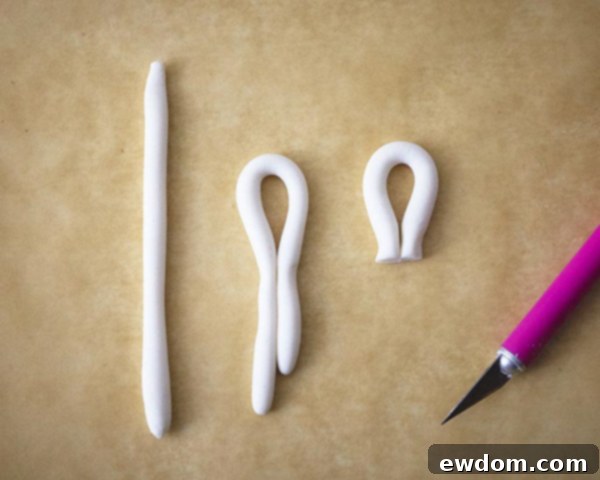 Shaping fondant into loops for Christmas Ornament Cakes