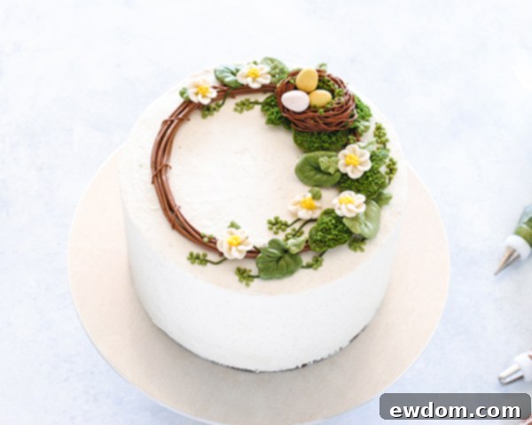 Spring Blossom Wreath Cake 19 Final detail shot of the Spring Wreath Cake with extra moss crumbles on the bird's nest and a strategically placed cherry blossom to cover an imperfection.