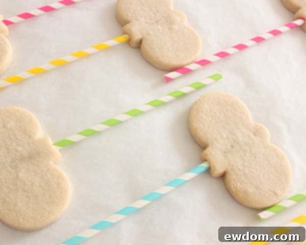 Pale pink royal icing in a piping bag, ready for decorating the bunny noses