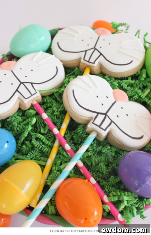 Close-up of a festive Bunny Face Cookie Pop with a pink nose and whiskers