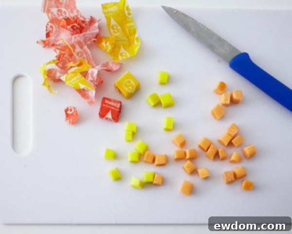 Mid-Century Meal Cake 9 How to make candy vegetables: Cut Starburst candies for realistic corn and carrots, mixed with green Sixlets for peas, for the TV Dinner Cake. By Cakegirls for TheCakeBlog.com