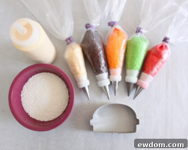 Piping ivory royal icing outline for hamburger buns