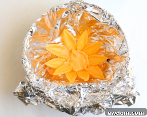 Sunflower Cake - how to make gorgeous sunflower cake decorations using melted chocolate | by Erin Gardner for TheCakeBlog.com