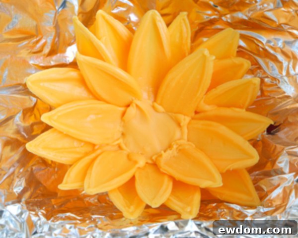Sunflower Cake - how to make gorgeous sunflower cake decorations using melted chocolate | by Erin Gardner for TheCakeBlog.com