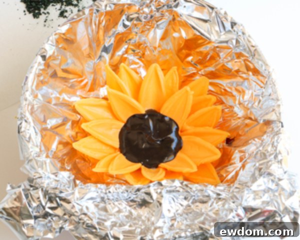 Sunflower Cake - how to make gorgeous sunflower cake decorations using melted chocolate | by Erin Gardner for TheCakeBlog.com