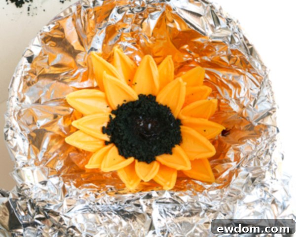 Sunflower Cake - how to make gorgeous sunflower cake decorations using melted chocolate | by Erin Gardner for TheCakeBlog.com