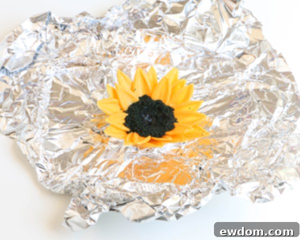 Sunflower Cake - how to make gorgeous sunflower cake decorations using melted chocolate | by Erin Gardner for TheCakeBlog.com