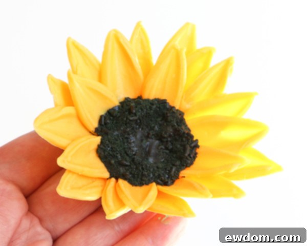 Sunflower Cake - how to make gorgeous sunflower cake decorations using melted chocolate | by Erin Gardner for TheCakeBlog.com