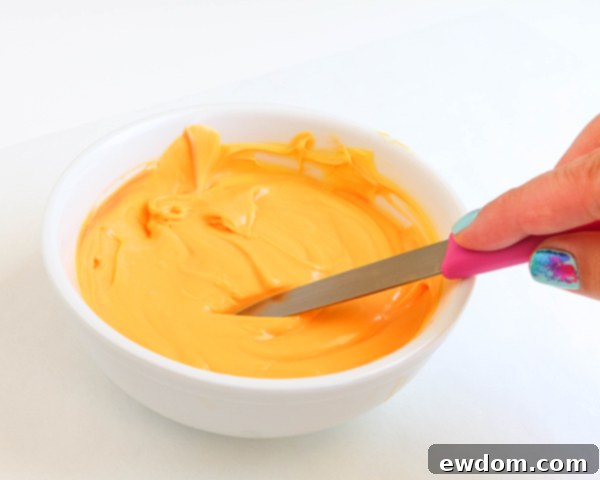 Sunflower Cake - how to make gorgeous sunflower cake decorations using melted chocolate | by Erin Gardner for TheCakeBlog.com