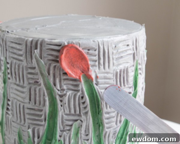 Close-up of a completed single buttercream petal, showing its artistic texture