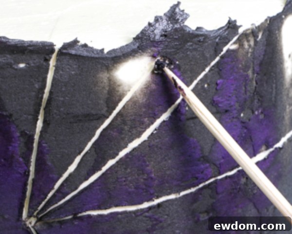 Spiderweb Cake - how to make an easy spiderweb cake with buttercream | by Erin Gardner for TheCakeBlog.com