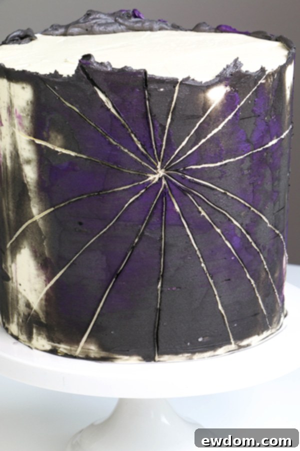 Spiderweb Cake - how to make an easy spiderweb cake with buttercream | by Erin Gardner for TheCakeBlog.com