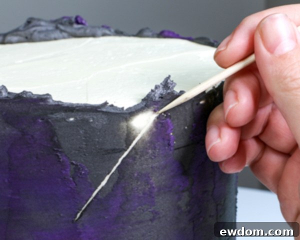 Spiderweb Cake - how to make an easy spiderweb cake with buttercream | by Erin Gardner for TheCakeBlog.com