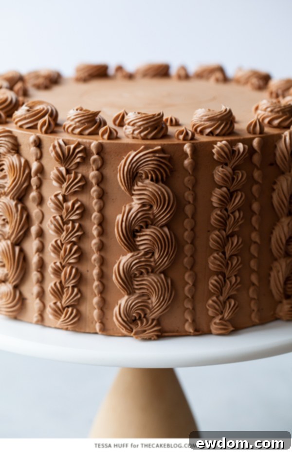 Golden Toffee Crunch Chocolate Cake 6 Close-up of the Chocolate Toffee Crunch Cake showing detailed piped patterns
