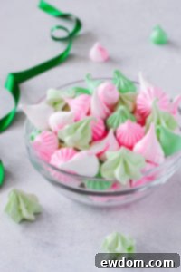 Sweet Whispers 8 Meringue Kisses - Melt-in-your-mouth mini meringue cookies that are light as air, naturally low calorie, dairy free, gluten free, and soy free. A close-up image of the finished meringue cookies.