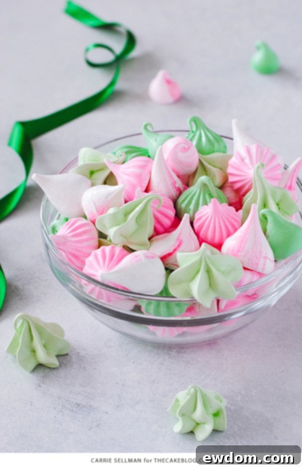 Sweet Whispers 9 Meringue Kisses - Melt-in-your-mouth mini meringue cookies that are light as air, naturally low calorie, dairy free, gluten free, and soy free. A close-up shot of several pastel-colored meringue kisses.