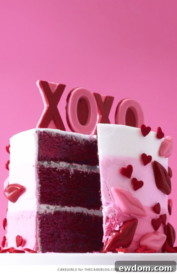 XOXO Valentine's Day Cake - how to make a pink ombre striped cake decorated with chocolate lips, hearts and an XOXO topper | by Cakegirls for TheCakeBlog.com