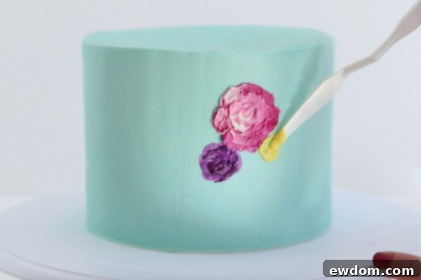 Arranging Supporting Flowers in a Buttercream Floral Design