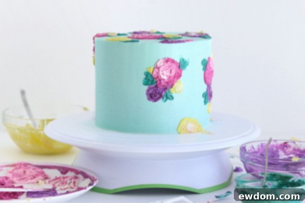 Repeating Buttercream Flower Designs Around the Entire Cake