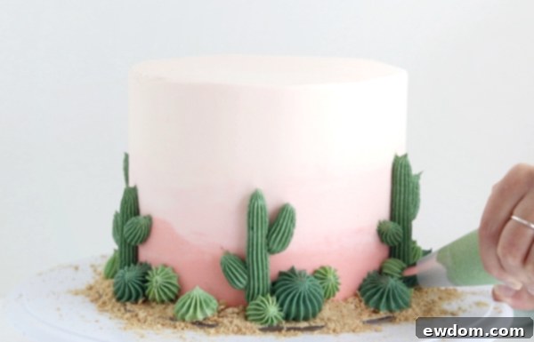 Desert Bloom Delight 17 Cactus Cake - how to make a cactus themed cake with ombrè buttercream, edible sand and piped buttercream cacti | by Whitney DePaoli for TheCakeBlog.com