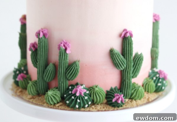 Desert Bloom Delight 19 Cactus Cake - how to make a cactus themed cake with ombrè buttercream, edible sand and piped buttercream cacti | by Whitney DePaoli for TheCakeBlog.com