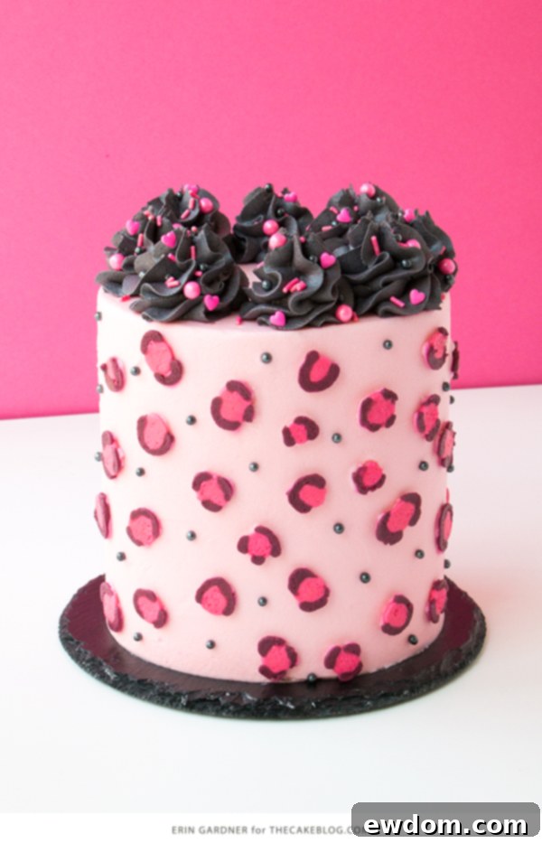 Chic Leopard Buttercream 17 Completed pink leopard print buttercream cake with elegant top decorations